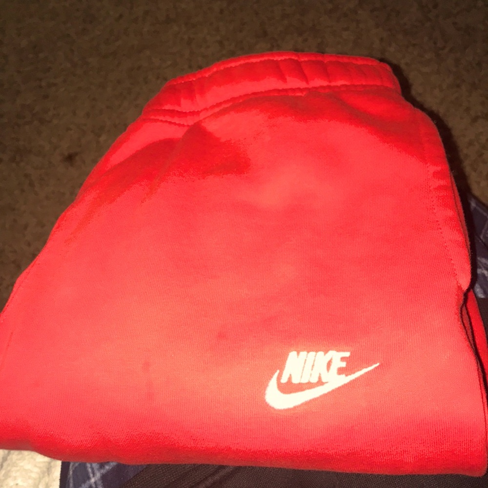 Red Nike sweatpants